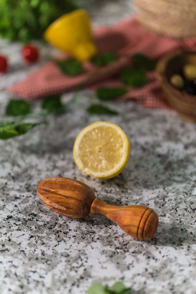 Olive Wooden lemon squeezer